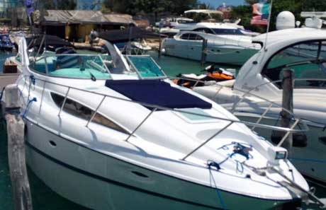 side view of bayliner yacht in docks